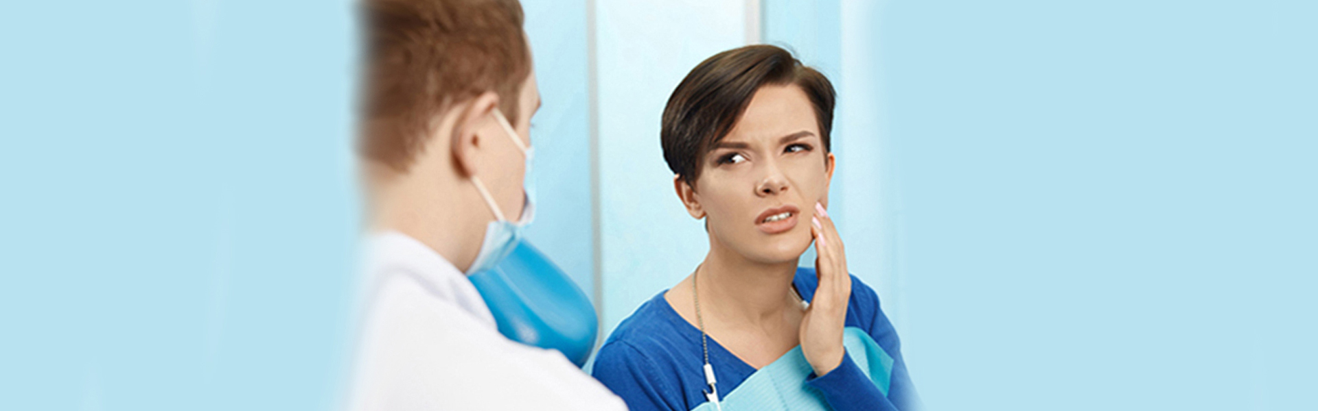 dentist and patient having conversation on dental extraction at summit pointe dental